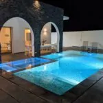 Villa Diamant — Piscine, Vue de nuit, arches en pierre et pataugeoire | Ethic Village Djerba