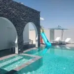 Villa Diamant — Pool, Slide, paddling pool, stone arches and sun loungers | Ethic Village Djerba