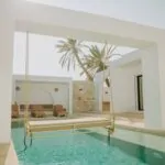 Villa Opale — Terrasse, Piscine, balançoire suspendue et salon | Ethic Village Djerba