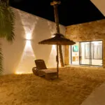 Villa Opale — Terrasse, Sable, palmier et hamac | Ethic Village Djerba