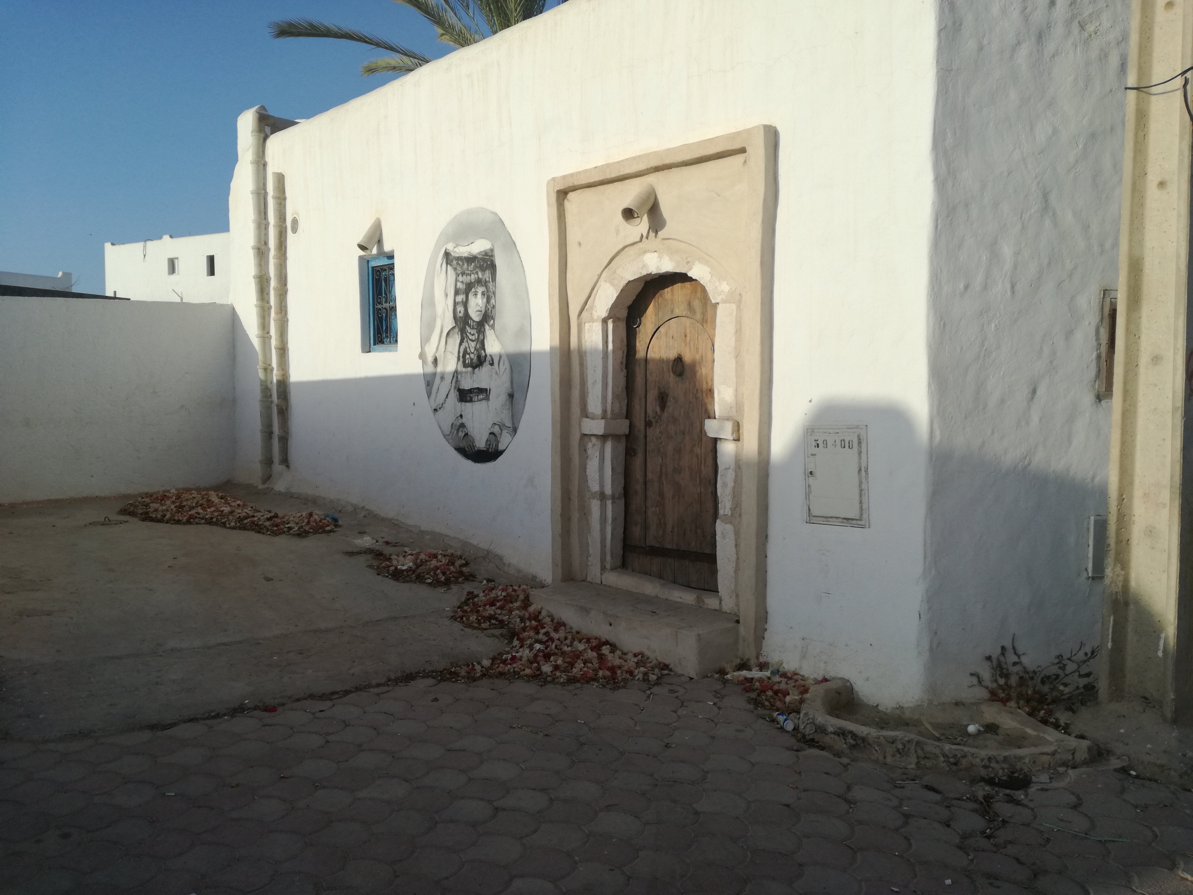 Djerbahood mural at Erriadh, Djerba — open-air street art museum village